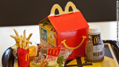 A Happy Meal is displayed for a photograph on a tray at a McDonald&#39;s Corp. restaurant in Little Falls, New Jersey, U.S., on Wednesday, Feb. 15, 2012. McDonald&#39;s Corp., the world&#39;s largest restaurant chain, said sales at stores open at least 13 months rose 6.7 percent globally last month as beverages and Chicken McBites helped the U.S. business. Photographer: Emile Wamsteker/Bloomberg via Getty Images