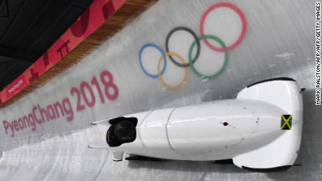 Team leader and driver Jazmine Fenlator-Victorian of Jamaica corners in the second women&#39;s unofficial bobsleigh training session at the Olympic Sliding Centre, ahead of the Pyeongchang 2018 Winter Olympic Games, in Pyeongchang on February 8, 2018. / AFP PHOTO / Mark Ralston        (Photo credit should read MARK RALSTON/AFP/Getty Images)