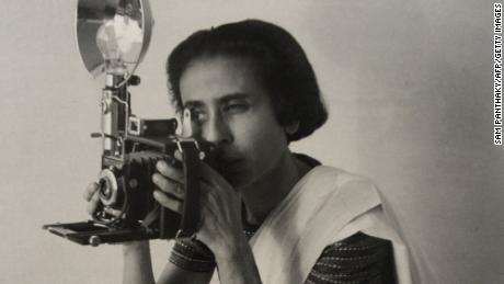 This reproduction of a picture from the Homai Vyarawala&#39;s collection shows Indian photographer Homai Vyarawalla in her early years. The picture was published in the book &quot;India In Focus : Camera Chronicles of Homai Vyarawalla&quot; authored by Sabeena Gadihoke. Vyarawalla, 98, died on January 15, 2012 in Vadodara. Vyarawalla photographed the last days of the British Empire and her work traces the birth and growth of a new nation. Vyarawalla was recently conferred Padma Vibhushan, India&#39;s second highest civilian honour   AFP PHOTO / Sam PANTHAKY (Photo credit should read -/AFP via Getty Images)