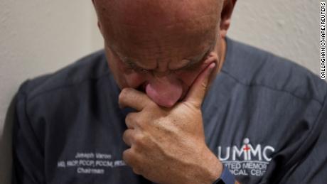 Dr. Joseph Varon, 58, the chief medical officer at United Memorial Medical Center (UMMC), checks his phone after getting home from work, during the coronavirus disease (COVID-19) outbreak,  in Houston, Texas, U.S., July 20, 2020.  REUTERS/Callaghan O&#39;Hare     SEARCH &quot;COVID-19 HOUSTON VARON&quot; FOR THIS STORY. SEARCH &quot;WIDER IMAGE&quot; FOR ALL STORIES.