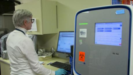 Doctors at University of Nebraska Medical Center analyze coronavirus lab test results that had just been processed.
