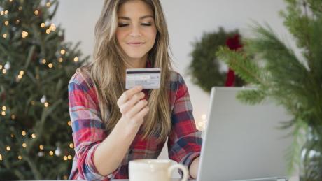 Young woman using credit card during online shopping; Shutterstock ID 284264177; Client: NerdWallet; region: United States; Name: selena lee
