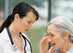 Photo of a woman and a nurse