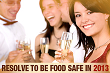 Group of young people celebrating New Year's eve. TEXT: Resolve to Be Food Safe in 2013 Group of young people celebrating New Year's eve. TEXT: Resolve to Be Food Safe in 2013